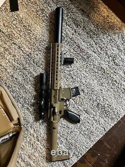 SIG SAUER MCX. 177 Caliber Co2 Powered 30 Rounds Air Rifle with Scope
